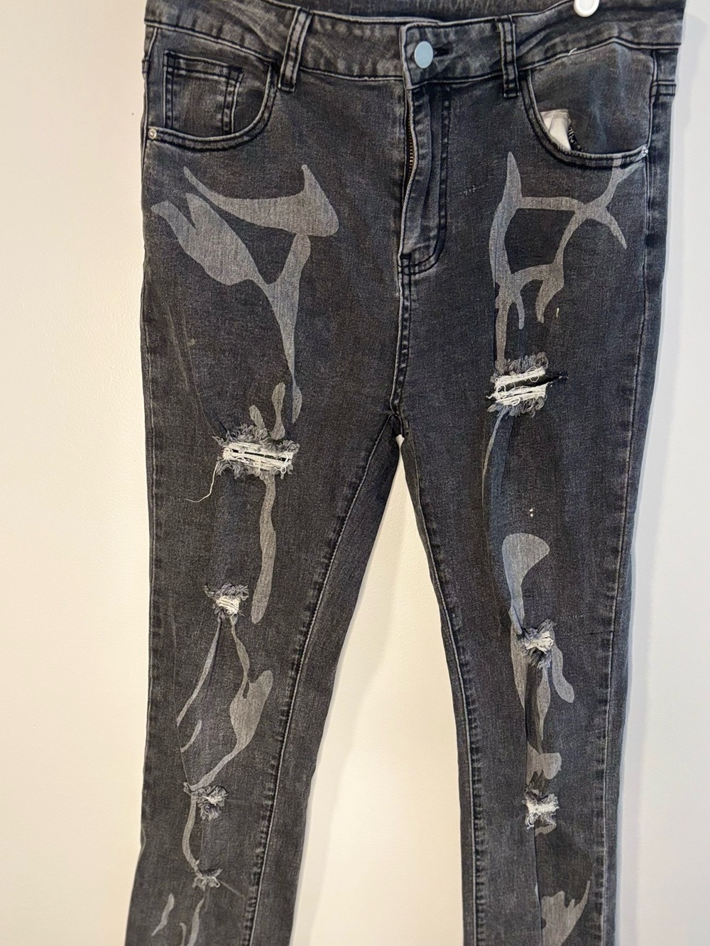 Women’s Black Distressed Skinny Jeans with Paint Detail